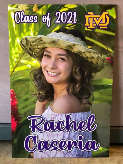 Class of 2021 graduation sign with school logo and portrait photo