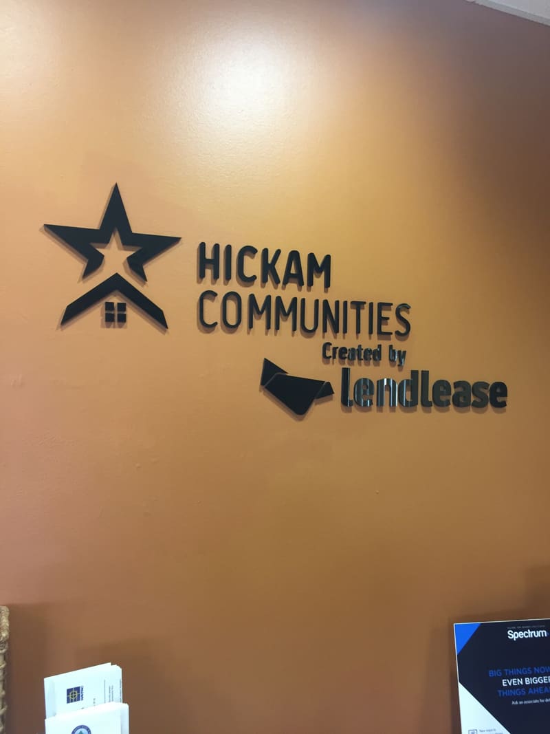 Hickam Communities dimensional lobby sign with Lendlease logo