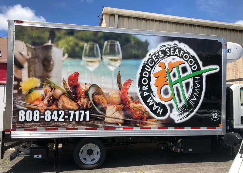 Ham Produce & Seafood refrigerated box truck with a full-color wrap