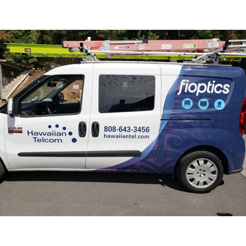 Hawaiian Telcom Fioptics cargo van with a full-color side wrap