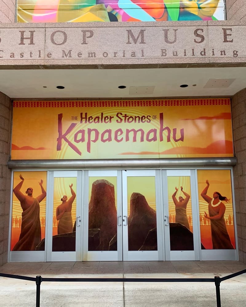 Bishop Museum entrance wrap for The Healer Stones of Kapaemahu exhibit