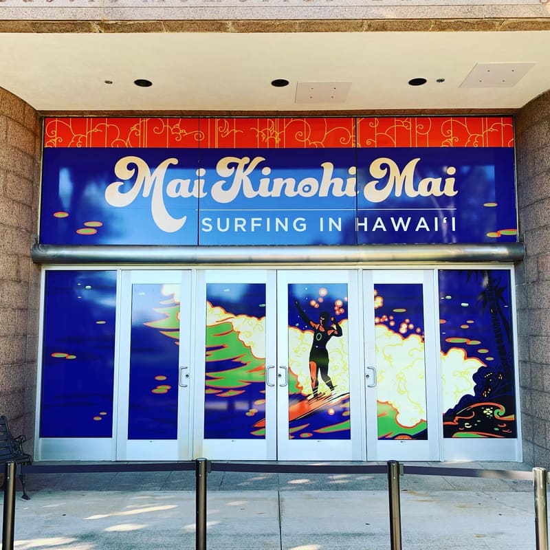 Entrance wall and door wrap for the Mai Kinohi Mai surfing exhibit